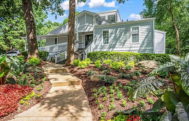 a house with a garden in front of it