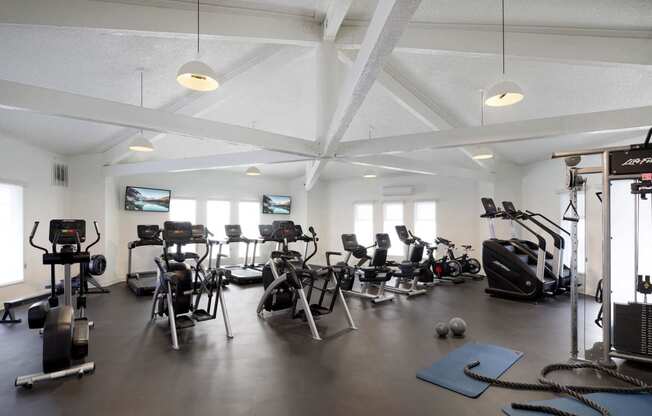 a gym with weights and other exercise equipment