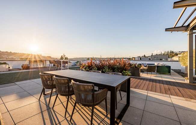Equinox Rooftop Terrence dining table at Equinox Apartments, Seattle, WA
