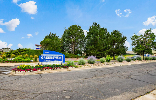 Property sign for Greensview Apartments in Aurora, CO