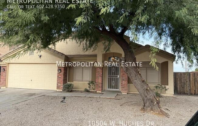 10504 W HUGHES DR
