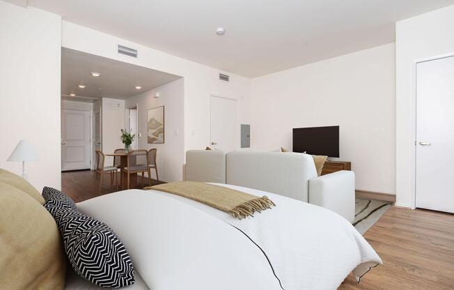 a bedroom with a large bed in a room