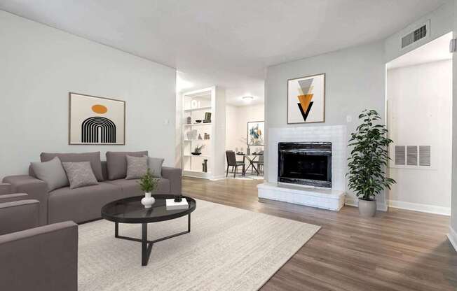 A living room with a fireplace and a couch.