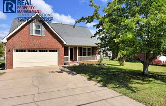 Adorable brick home in Smyrna! Attached Garage and Washer and Dryer Included!!