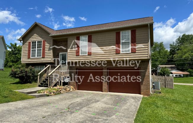 PRICE IMPROVEMENT! MOVE IN READY! Spacious 4 Bed/2 Bath West Knoxville Home with GARAGE and FENCED YARD