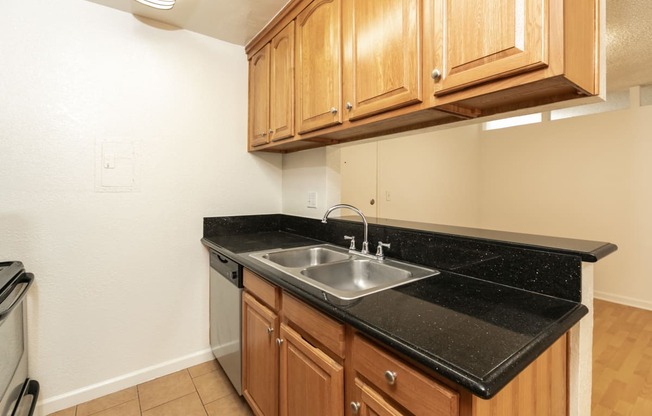 Kitchen with Stainless Steel Appliances and Wood Cabinets