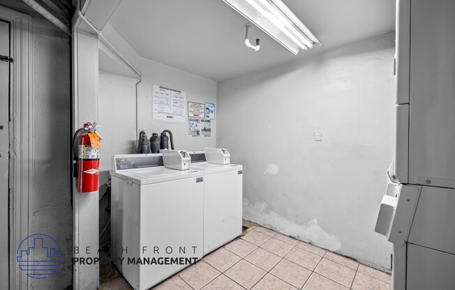 a laundry room with a washing machine and a fire hydrant