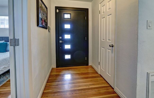Furnished, Mid-Century Modern beauty located down town!
