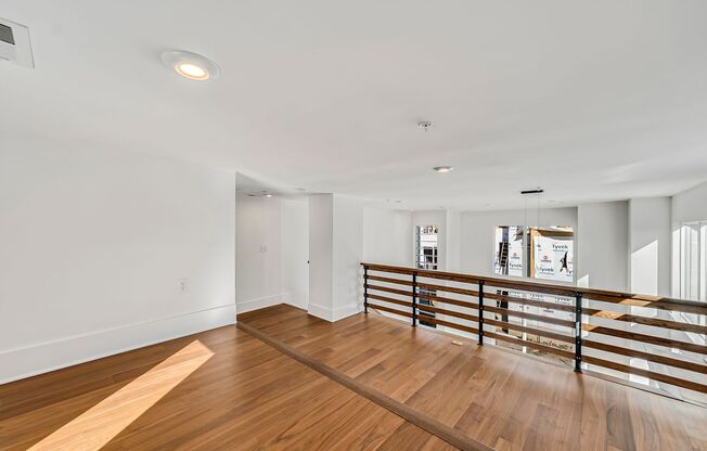 Spacious new downtown townhouse with 2 bedrooms, 2 full baths, 2 half baths and private rooftop terrace!