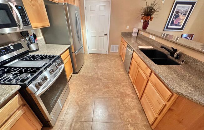 DISCOVER CONTEMPORARY LIVING IN THIS STYLISH TOP-FLOOR 2-BEDROOM, 2-BATHROOM CONDO LOCATED IN THE HIGHLY DESIRABLE SOUTHWEST LAS VEGAS AREA.