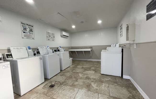 the laundry room is equipped with washes and dryers