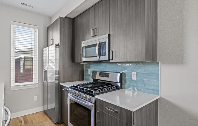 1 bed, 1.5 baths, 748 sqft, $1,650, Unit 5165 W 10th Ave