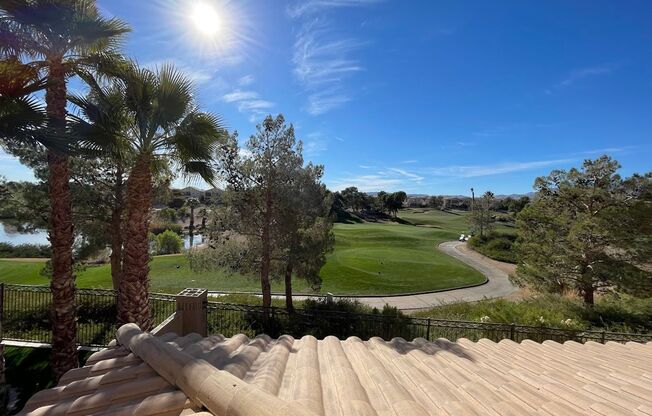 Stunning golf course view! Beautiful home is located on golf course inside Rhodes Ranch guard gated community! Master bedroom is downstairs!