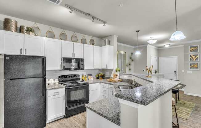 Eat-In Kitchen Table With Sink at Sterling Creek at Richmond Hill, Richmond Hill, GA, Georgia , 31324