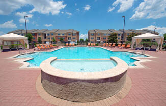 Resort Inspired Pool with Sundeck and Cabanas.