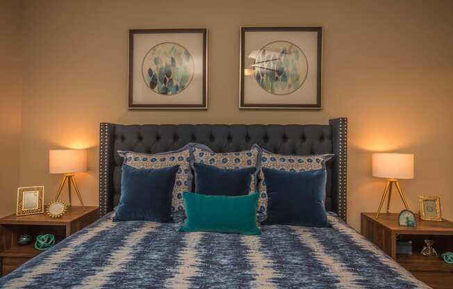 Bedroom with beautiful lamp at Level 25 at Oquendo by Picerne, Las Vegas, NV, 89148