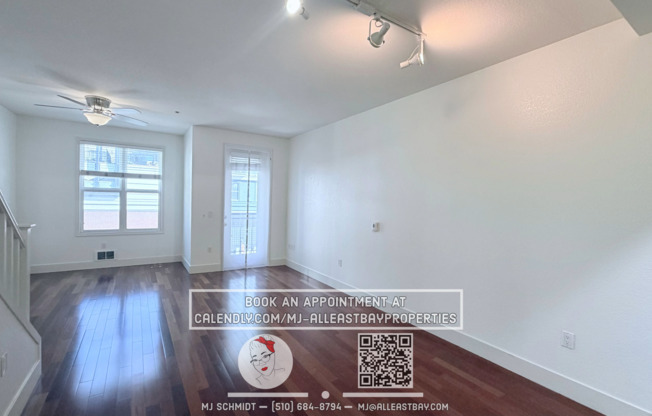 3-bed, 1.5-bath two-story condo, with rich hardwood floors, a modern kitchen, and spacious bedrooms with natural light. located above bustling Bay St. with shopping and restaurants steps away.