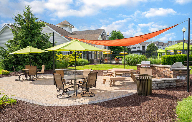 Outdoor Grilling Area with Outdoor Dining Tables