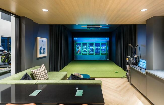 Perfect your swing or enjoy a game night in the private golf simulator lounge at Modera Beaverton.