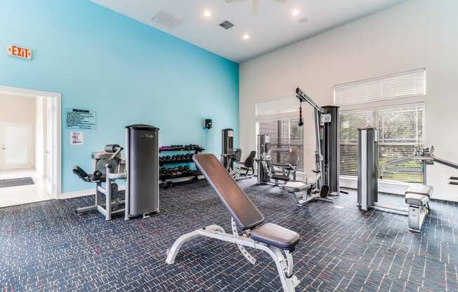the reserve at bucklin hill fitness center with exercise equipment and windows