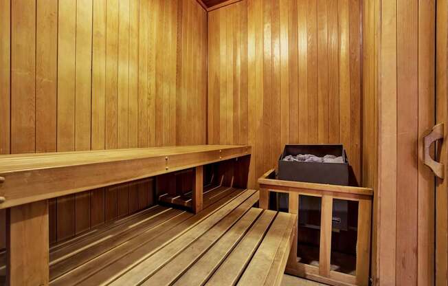 A sauna with wooden benches and walls. at Midvale Court, Los Angeles