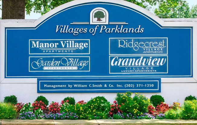 Villages of parklands monument sign next to manor village apartments in washington dc