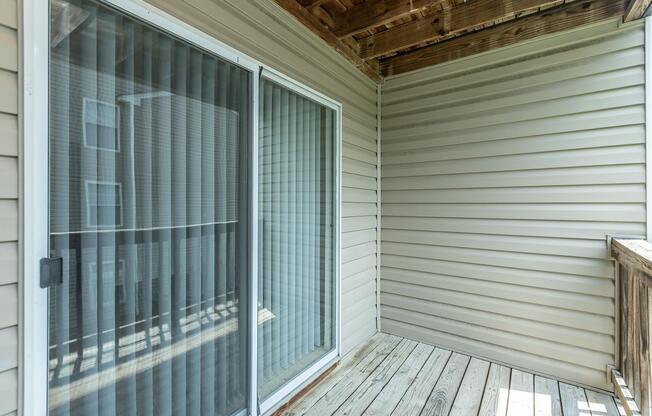 a bench in front of a window