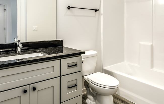 Large bathrooms with granite countertops at Edge 204 Apartments in Omaha, NE