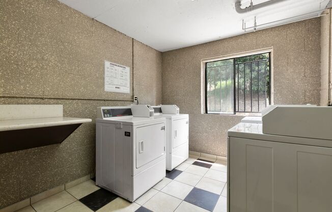 Apartments for Rent in Sherman Oaks, CA- Brody Terrace- Communal Laundry Room Washer and Dryer Units with Tile Floors and Spacious Window
