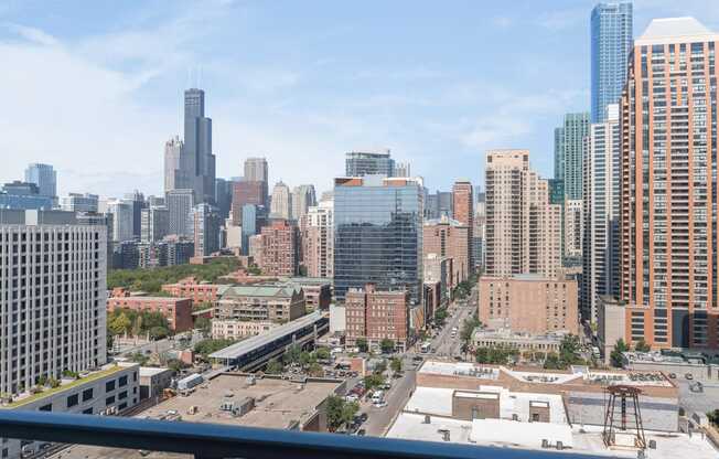 a view of the city from a balcony at One 333, Chicago, IL