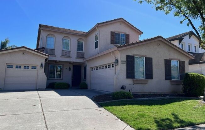 Elk Grove home with fresh paint, close to schools, parks and shopping.