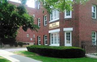 A red brick building with the number 440 Broadway on the front.