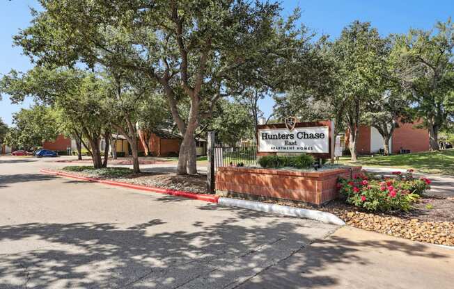 Property signage at the entrance area at Hunters Chase in Austin, TX