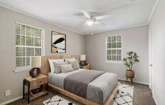 spacious bedrooms  Living Room with wood flooring at Midtown Oaks Townhomes in Mobile, AL