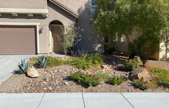 NW!!! 4 bedrooms!!! Pool and Spa!!! All tile floors downstairs!! All Appliances!! Custom Cabinets in Garage with Water Softener!!!
