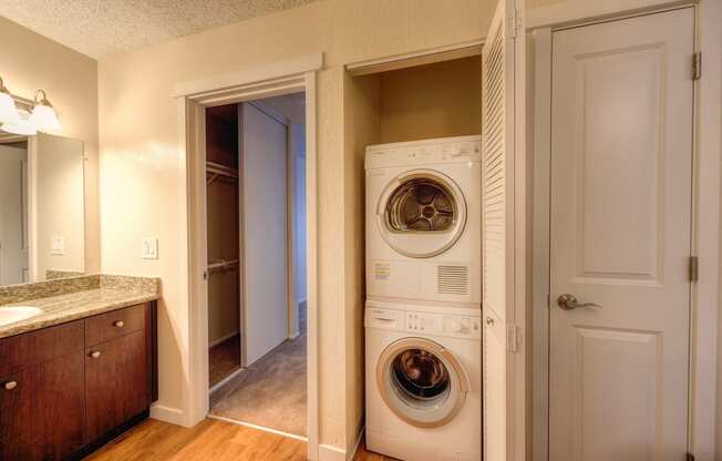 In Unit Washer Dryer and Bathroom Vanity with Hardwood Inspired Floor