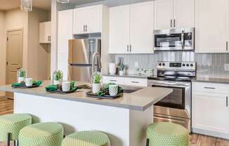 Upgraded Kitchen with Stainless Steel Appliances at Apartments CO Springs