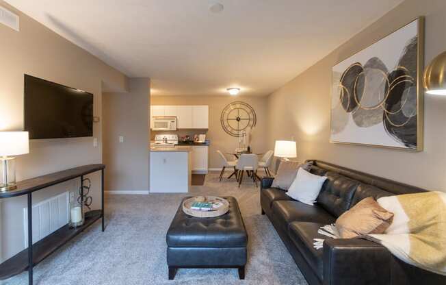 This is a photo of the living room of the 890 square foot 2 bedroom, 2 bath Liberty at Washington Place Apartments in in Miamisburg, Ohio in Washington Township.