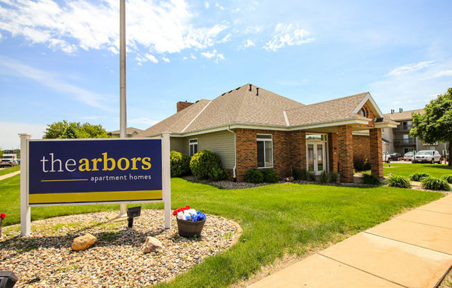 a house with a sign in front of it
