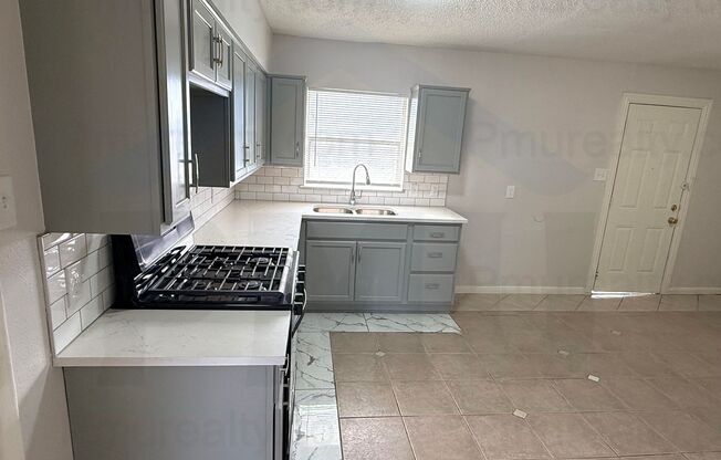 AVAILABLE NOW!!! Classic Red-Brick 4-Bed, 1-Bath Home (Near I35!)