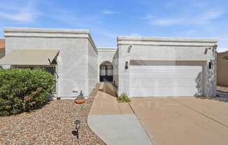 10602 E ELMHURST DR