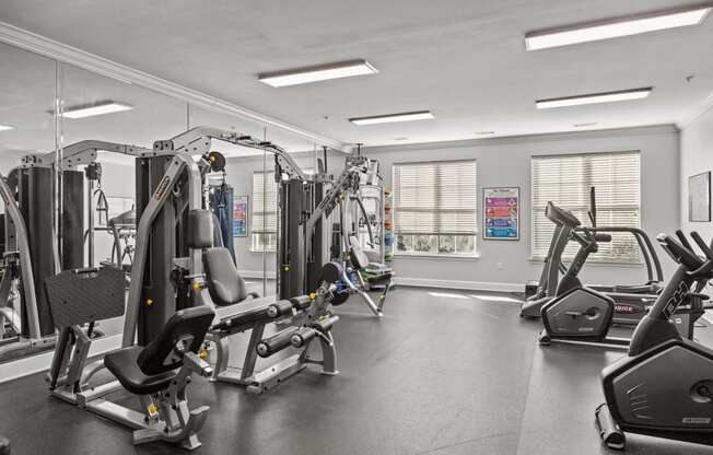 the gym at the district flats apartments in lenexa