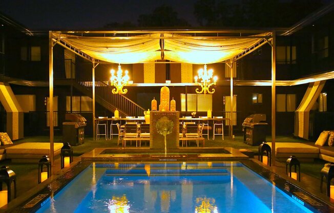 5601 Gaston The London Chandelier And Pool At Nighttime