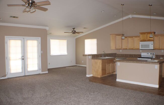 Charming 3-Bedroom Home with Fireplace, Spacious Backyard & Attached Garage in California City!