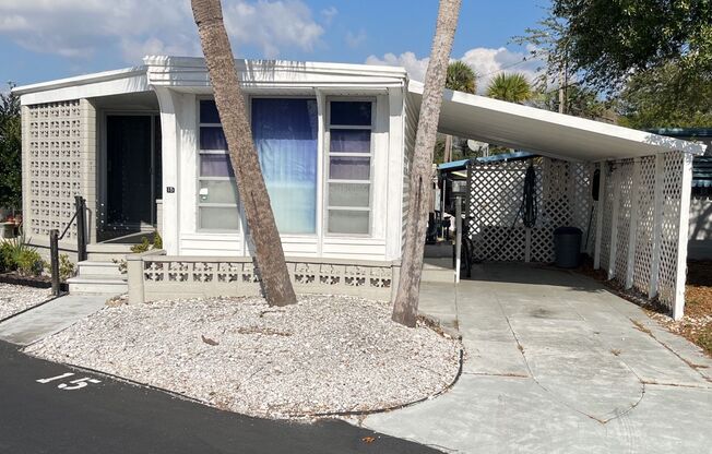 Beautiful fully furnished one bedroom, one bath manufactured home in a 55+ deed restricted gated community.