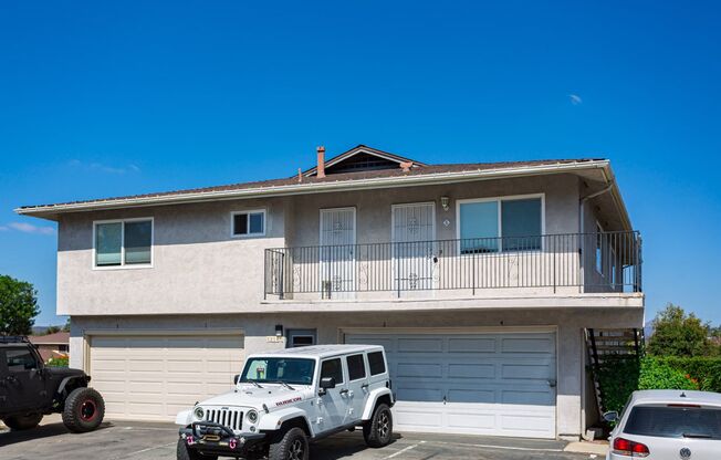 Adorable Upper Unit Condo with 1 Car Garage!