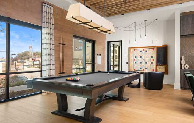 pool table in the game room at ironridge at hill country village apartments