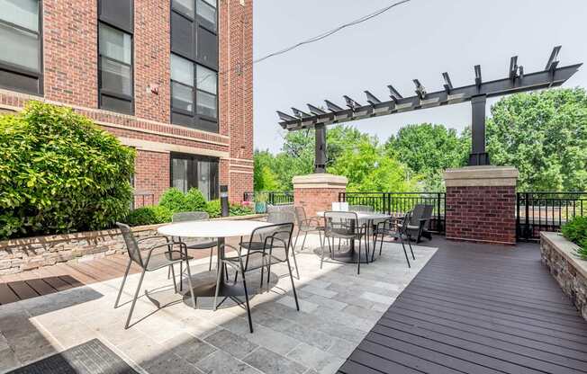 Image showing social hub, styled just right. Outdoor seating and garden surroundings create the perfect outdoor escape.