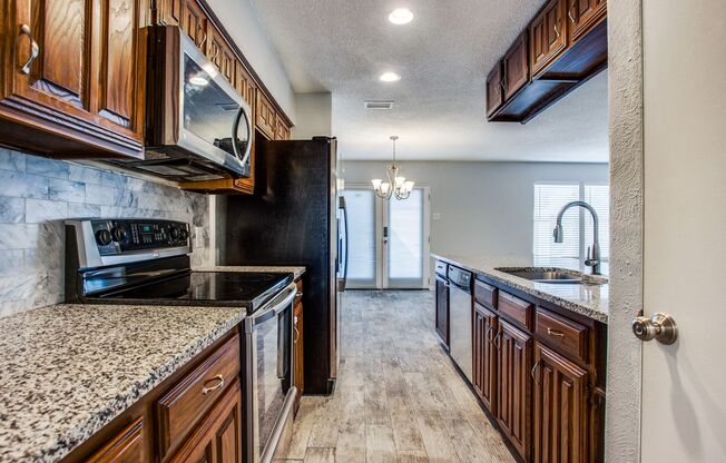 2-Bedroom Condo in Garland - Private Patio & Two Car Garage