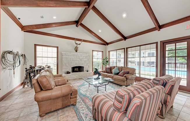 A living room with a statue in the middle of the room.